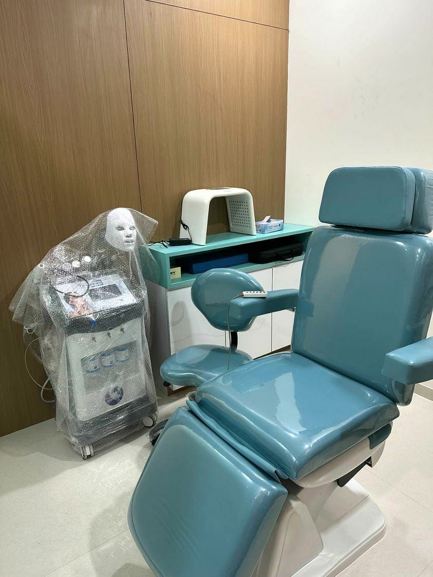 Treatment room with procedure chair at The Pune Skin Clinic